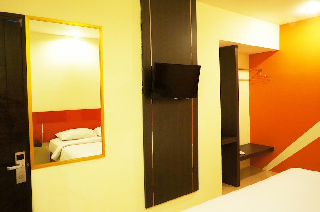 Quin Centro Hotel Palembang Room photo
