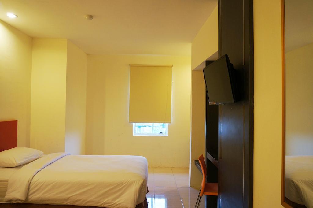 Quin Centro Hotel Palembang Exterior photo